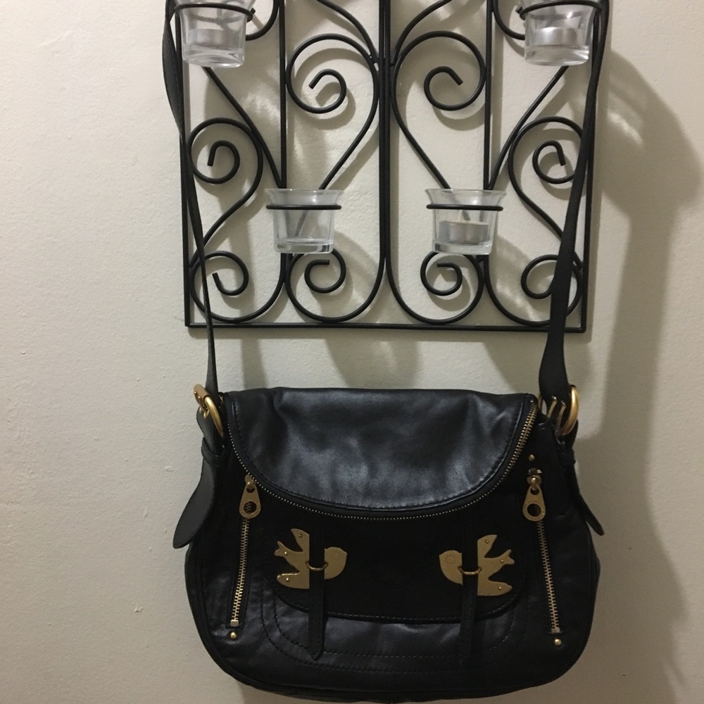 Black Marc Jacobs “Petal to the Metal” purse.